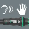 A close-up view of a torque wrench with icons indicating auditory and tactile feedback, and a digital display. Náhled obrázku produktu