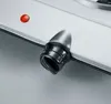 Close-up of a stove control knob and indicator light. Náhled obrázku produktu