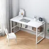A white computer desk with shelves, a laptop, books, and a chair in a room with natural light. Podgląd zdjęcia produktu