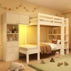 A child's bedroom with a bunk bed and storage unit. Anteprima dell’immagine prodotto