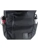 A close-up view of the front of a black backpack, showing side pockets with water bottles and a zippered pocket. Náhľad obrázku produktu