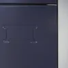 A close-up view of a dark gray metal locker door with an embossed handle. Anteprima dell’immagine prodotto