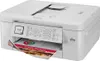 A white Brother MFC-J1010DW multifunction printer is shown from a slightly elevated front-left angle, with a printed document partially emerging from the output tray. Podgląd zdjęcia produktu