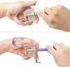 Two close-up shots of hands demonstrating how to use a lockpicking set on a transparent padlock. Podgląd zdjęcia produktu