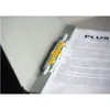 A close-up shot of a gray binder with a yellow and gray document clip holding papers inside. Anteprima dell’immagine prodotto