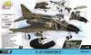A collage of images showcasing a Cobi F-4F Phantom II model airplane kit, including close-ups of features and a scale reference. Produktbild-Vorschau