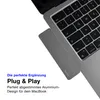A close-up view of a MacBook with a USB-C hub attached, with marketing text overlayed. Produktbild-Vorschau