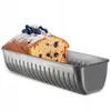A loaf of blueberry cake is shown inside a loaf pan. Podgląd zdjęcia produktu