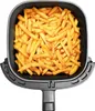 A top-down view of an air fryer basket filled with french fries. Produktbild-Vorschau