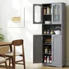 A gray kitchen cabinet with multiple doors and shelves is shown in a room with a table and chairs. Náhľad obrázku produktu