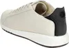 A side view of a white Geox sneaker with a black heel accent. Náhled obrázku produktu