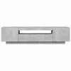 A modern, grey concrete-effect TV stand with a sleek, minimalist design. It features a central open shelf and two cabinet sections, one on each side, with handleless fronts. Anteprima dell’immagine prodotto