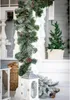Christmas garland and decorations on a porch. Náhled obrázku produktu