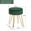 A dark green velvet stool with gold metal legs, shown with dimensions and maximum load capacity indicated by text overlays. Produktbild-Vorschau