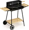 A black charcoal grill with wooden shelves and wheels, set against a white background. Náhľad obrázku produktu