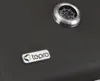 A close-up view of a grill's surface, showing a thermometer and a brand logo. Produktbild-Vorschau