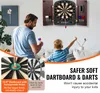 A father and son are playing darts in a living room. Anteprima dell’immagine prodotto