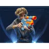 A young person aiming a Nerf gun in a futuristic setting. Podgląd zdjęcia produktu