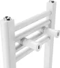 A close-up view of a white towel radiator. Náhled obrázku produktu