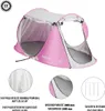 A pink pop-up tent with white accents, shown from a diagonal view. Several close-up shots of the tent's material and included pegs are displayed below. Produktbild-Vorschau