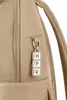 A close-up of a backpack zipper pull with decorative charms. Produktbild-Vorschau