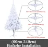A white artificial Christmas tree with diagrams showing different stand options and sizes. Voir les images du produit