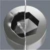 A close-up, torn image showing the interior of a hexagonal socket on the right and the damaged exterior of another socket on the left. Produktbild-Vorschau