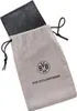A black wallet is partially inside a gray drawstring bag with the Borussia Dortmund logo and text. Produktbild-Vorschau
