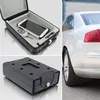 A collage of images showing a car safe box, its interior with a phone and keys, and its exterior, with a partial view of a car in the background. Podgląd zdjęcia produktu