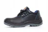 A black work boot with blue stitching and a gray sole, shown from the side against a white background. Produktbild-Vorschau
