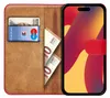 A book-style phone case with a credit card and euro banknotes inside, and a smartphone displayed. Produktbild-Vorschau