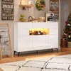 A white sideboard with LED lighting is shown in a room with a Christmas tree and other decorative items. Voir les images du produit