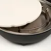 Close-up view of the interior of an electric pizza oven, showing a pizza stone resting on a heating element. Náhľad obrázku produktu