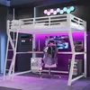 A modern gaming bedroom setup featuring a white loft bed with a desk underneath, a gaming chair, a computer, and a mini-fridge. Voir les images du produit