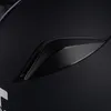 A close-up view of a black helmet vent. Náhled obrázku produktu
