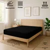 A black fitted sheet is shown on a wooden bed frame in a bedroom setting. Produktbild-Vorschau