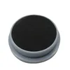 A close-up, studio shot of a round, gray object with a black textured surface on a white background. Produktbild-Vorschau