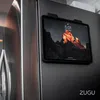 A tablet is mounted on a refrigerator door using a magnetic stand. Produktbild-Vorschau