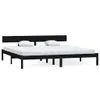 A black wooden bed frame with a white mattress and two white pillows, shown against a white background. Produktbild-Vorschau