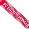 A red and white scarf with the text "FC BAYERN MÜNCHEN" knitted into it. Produktbild-Vorschau
