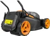 A close-up, angled view of a black and orange electric lawnmower against a white background. Produktbild-Vorschau