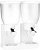 A white double cereal dispenser with clear containers and silver butterfly-shaped handles. Produktbild-Vorschau