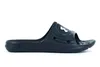 A black Under Armour slide sandal is shown from the side against a white background. Anteprima dell’immagine prodotto