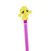 A yellow poodle figurine on top of a pink pencil. Podgląd zdjęcia produktu