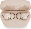 A pair of pink and beige true wireless earbuds are shown inside their charging case, which is open. Anteprima dell’immagine prodotto