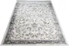A close-up, angled view of a cream and light gray patterned rug. Produktbild-Vorschau