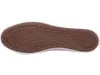 The sole of a shoe is shown against a white background. Voir les images du produit