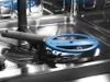A close-up view of the interior of a dishwasher, focusing on the spray arm and filter. Anteprima dell’immagine prodotto