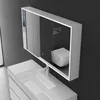 A modern bathroom vanity with a sink and a lighted medicine cabinet above it. Produktbild-Vorschau