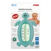 The image shows the packaging of a Reer Badethermometer turtle-shaped bathtub thermometer. A baby is visible in the background. Anteprima dell’immagine prodotto